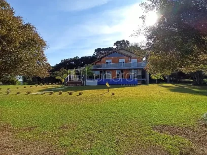 Casa com 4 Dormitórios - Miniatura - Lunardi Imóveis