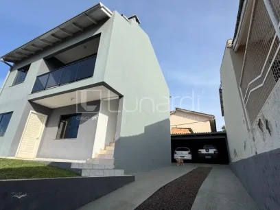 Casa com 4 Dormitórios - Miniatura - Lunardi Imóveis