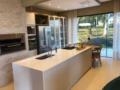 Casa com 4 Dormitórios - Miniatura - Lunardi Imóveis