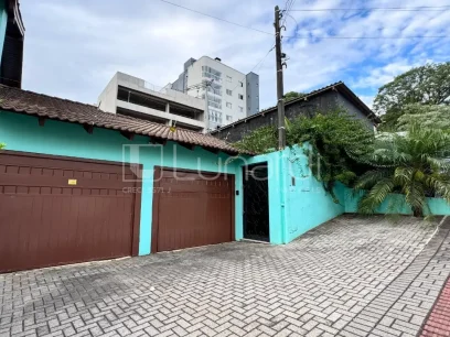 Casa com 4 Dormitórios - Miniatura - Lunardi Imóveis