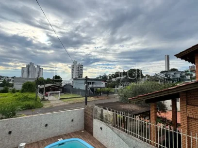 Casa com 4 Dormitórios - Miniatura - Lunardi Imóveis