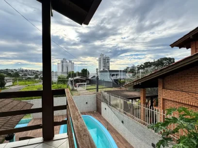 Casa com 4 Dormitórios - Miniatura - Lunardi Imóveis