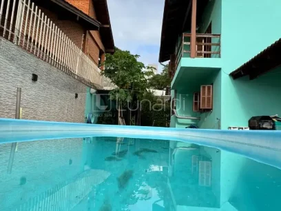 Casa com 4 Dormitórios - Miniatura - Lunardi Imóveis