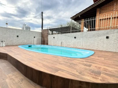 Casa com 4 Dormitórios - Miniatura - Lunardi Imóveis