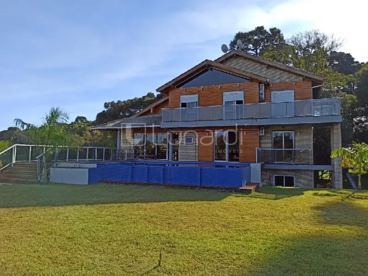 Casa com 4 Dormitórios - Lunardi Imóveis