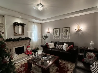 Casa com 4 Dormitórios - Miniatura - Lunardi Imóveis