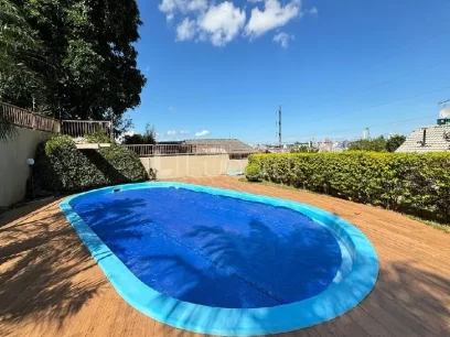 Casa com 4 Dormitórios - Miniatura - Lunardi Imóveis