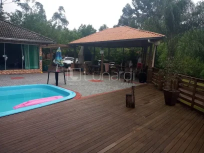 Casa com 4 Dormitórios - Miniatura - Lunardi Imóveis