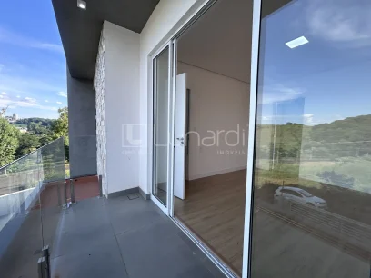 Casa com 4 Dormitórios - Miniatura - Lunardi Imóveis