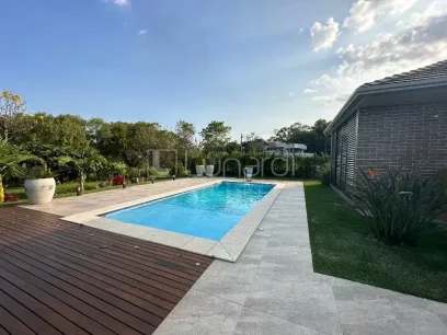 Casa com 4 Dormitórios - Miniatura - Lunardi Imóveis