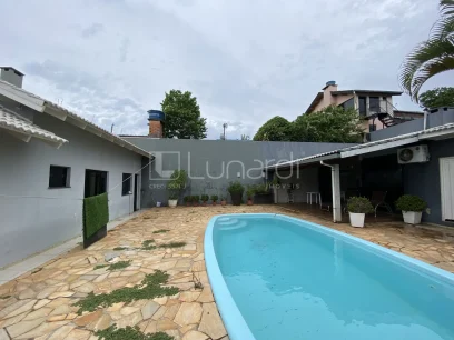 Casa com 3 Dormitórios - Miniatura - Lunardi Imóveis