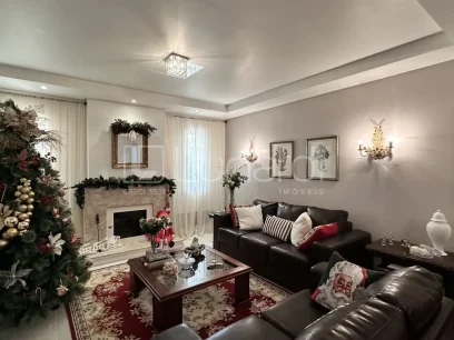 Casa com 4 Dormitórios - Miniatura - Lunardi Imóveis