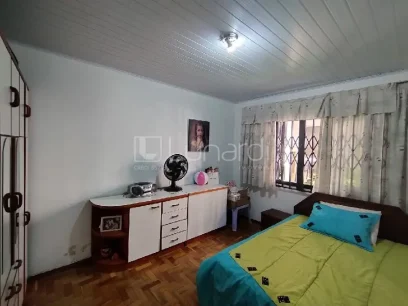 Casa com 3 Dormitórios - Miniatura - Lunardi Imóveis