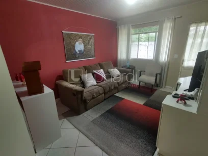 Casa com 4 Dormitórios - Miniatura - Lunardi Imóveis