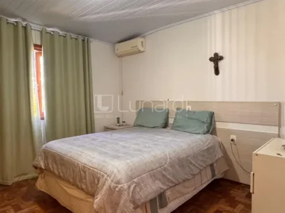 Casa com 3 Dormitórios - Miniatura - Lunardi Imóveis