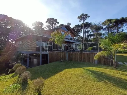 Casa com 4 Dormitórios - Miniatura - Lunardi Imóveis