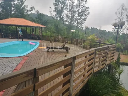 Casa com 4 Dormitórios - Miniatura - Lunardi Imóveis