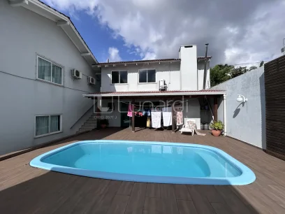 Casa com 4 Dormitórios - Miniatura - Lunardi Imóveis