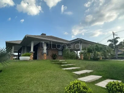 Casa com 4 Dormitórios - Miniatura - Lunardi Imóveis