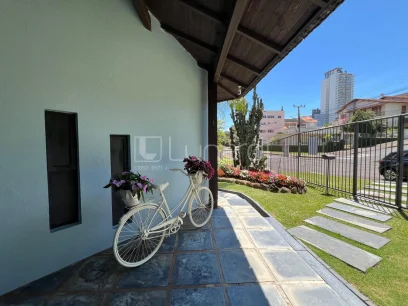 Casa com 3 Dormitórios - Miniatura - Lunardi Imóveis