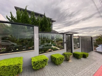 Casa com 3 Suítes - Miniatura - Lunardi Imóveis