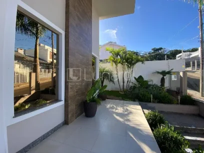 Casa com 4 Dormitórios - Miniatura - Lunardi Imóveis