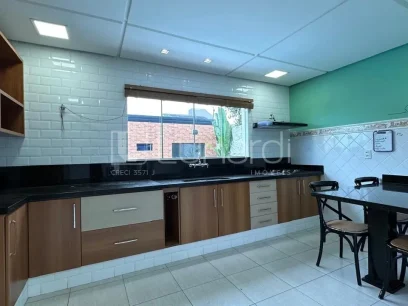 Casa com 4 Dormitórios - Miniatura - Lunardi Imóveis