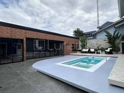 Casa com 4 Dormitórios - Miniatura - Lunardi Imóveis