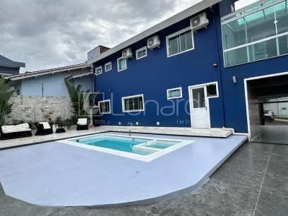 Casa com 4 Dormitórios - Miniatura - Lunardi Imóveis