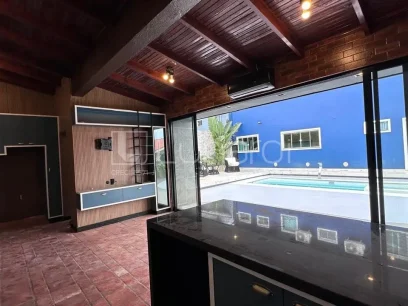 Casa com 4 Dormitórios - Miniatura - Lunardi Imóveis