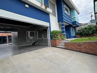 Casa com 4 Dormitórios - Miniatura - Lunardi Imóveis