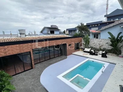 Casa com 4 Dormitórios - Miniatura - Lunardi Imóveis