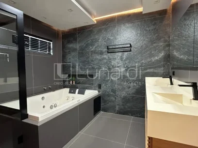 Casa com 4 Dormitórios - Miniatura - Lunardi Imóveis