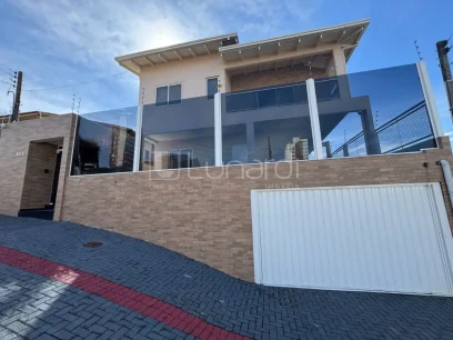 Casa com 5 Dormitórios - Miniatura - Lunardi Imóveis