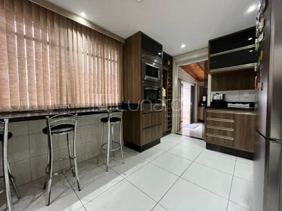 Casa com 4 Dormitórios - Miniatura - Lunardi Imóveis