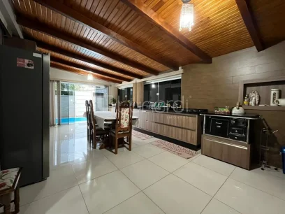 Casa com 4 Dormitórios - Miniatura - Lunardi Imóveis