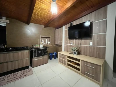 Casa com 4 Dormitórios - Miniatura - Lunardi Imóveis