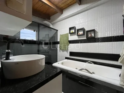 Casa com 4 Dormitórios - Miniatura - Lunardi Imóveis