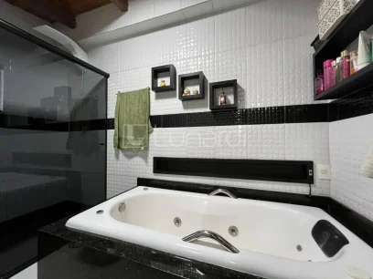 Casa com 4 Dormitórios - Miniatura - Lunardi Imóveis