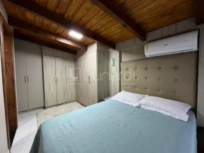 Casa com 4 Dormitórios - Miniatura - Lunardi Imóveis