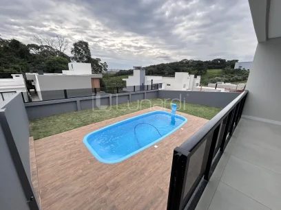 Casa com 3 Dormitórios - Miniatura - Lunardi Imóveis