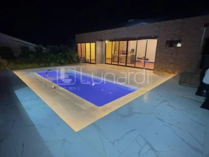 Casa com 4 Dormitórios - Miniatura - Lunardi Imóveis