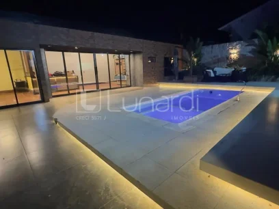 Casa com 4 Dormitórios - Miniatura - Lunardi Imóveis