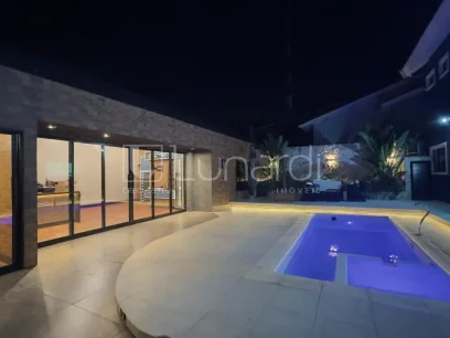 Casa com 4 Dormitórios - Miniatura - Lunardi Imóveis