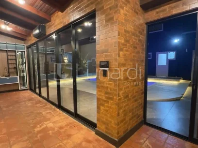 Casa com 4 Dormitórios - Miniatura - Lunardi Imóveis