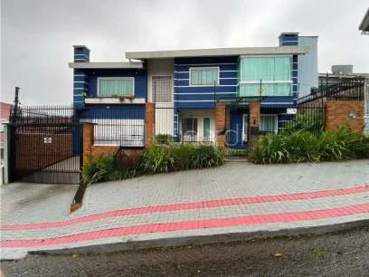 Casa com 4 Dormitórios - Miniatura - Lunardi Imóveis