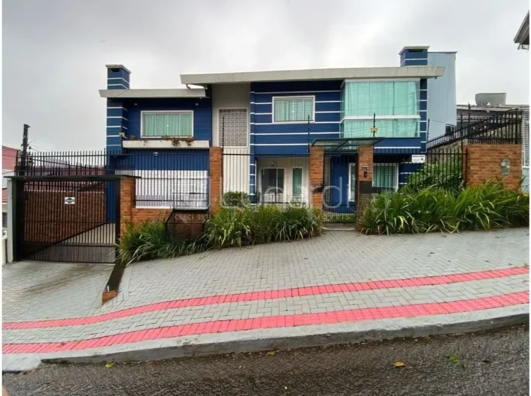 Casa com 4 Dormitórios - Lunardi Imóveis