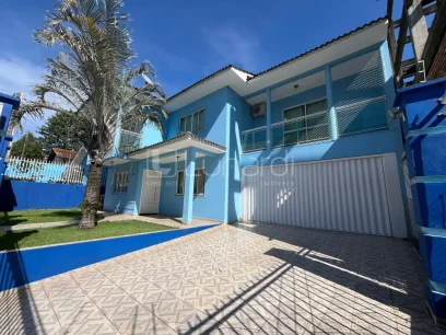 Casa com 4 Dormitórios - Lunardi Imóveis