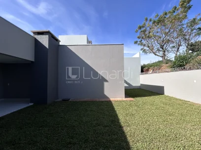 Casa com 3 Dormitórios - Miniatura - Lunardi Imóveis