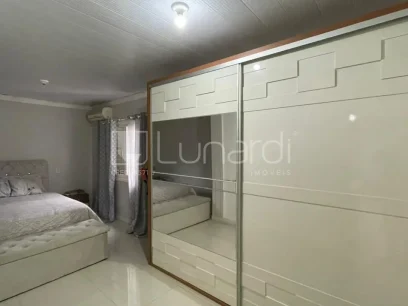 Casa com 3 Dormitórios - Miniatura - Lunardi Imóveis